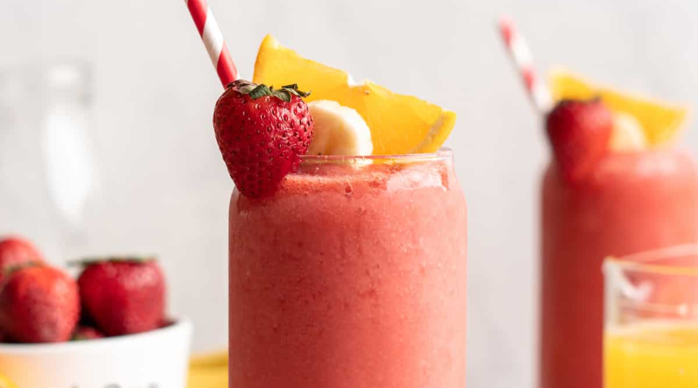  three women on a swing drinking smoothies