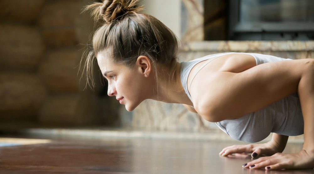 Woman planking at home