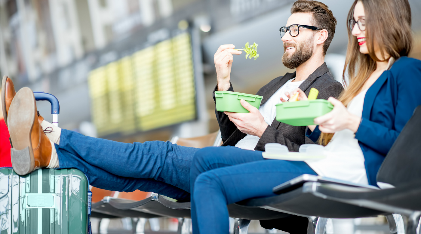  Fit couple eating heathy on bench