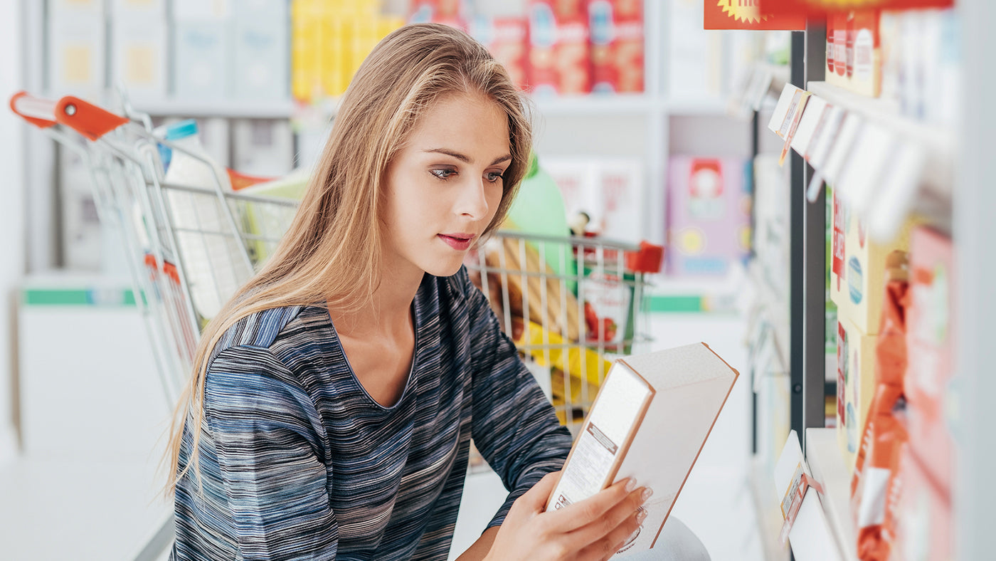  woman looking at food label