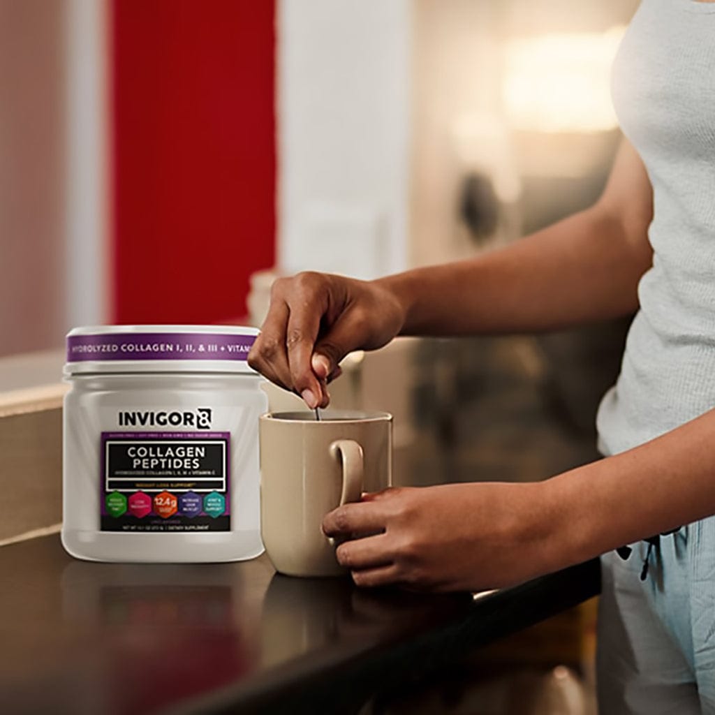  Woman mixing INVIGOR8 Collagen Peptides in coffee