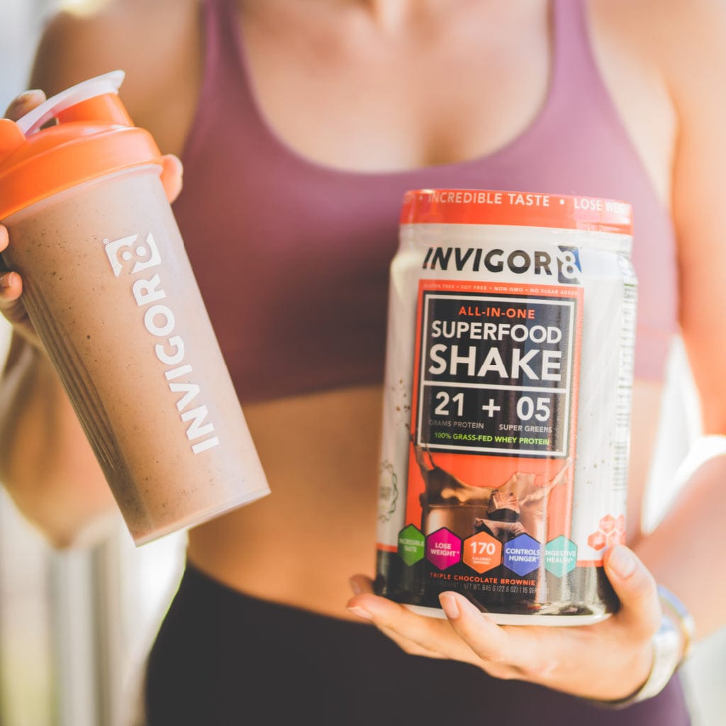  woman making invigor8 protein shake